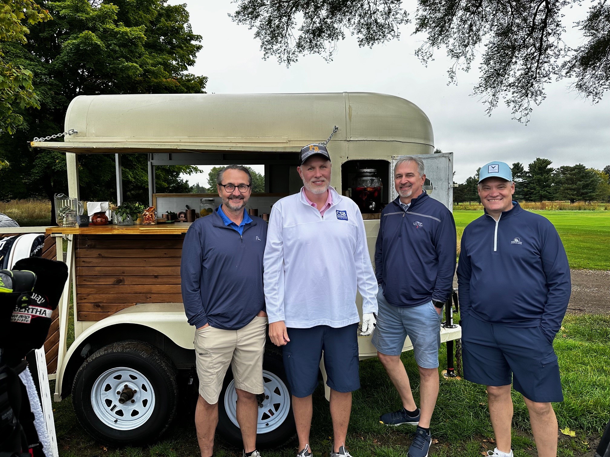 Jim, Joe, Bill and Mark posing for a photo at the Howell Chamber Golf Outing